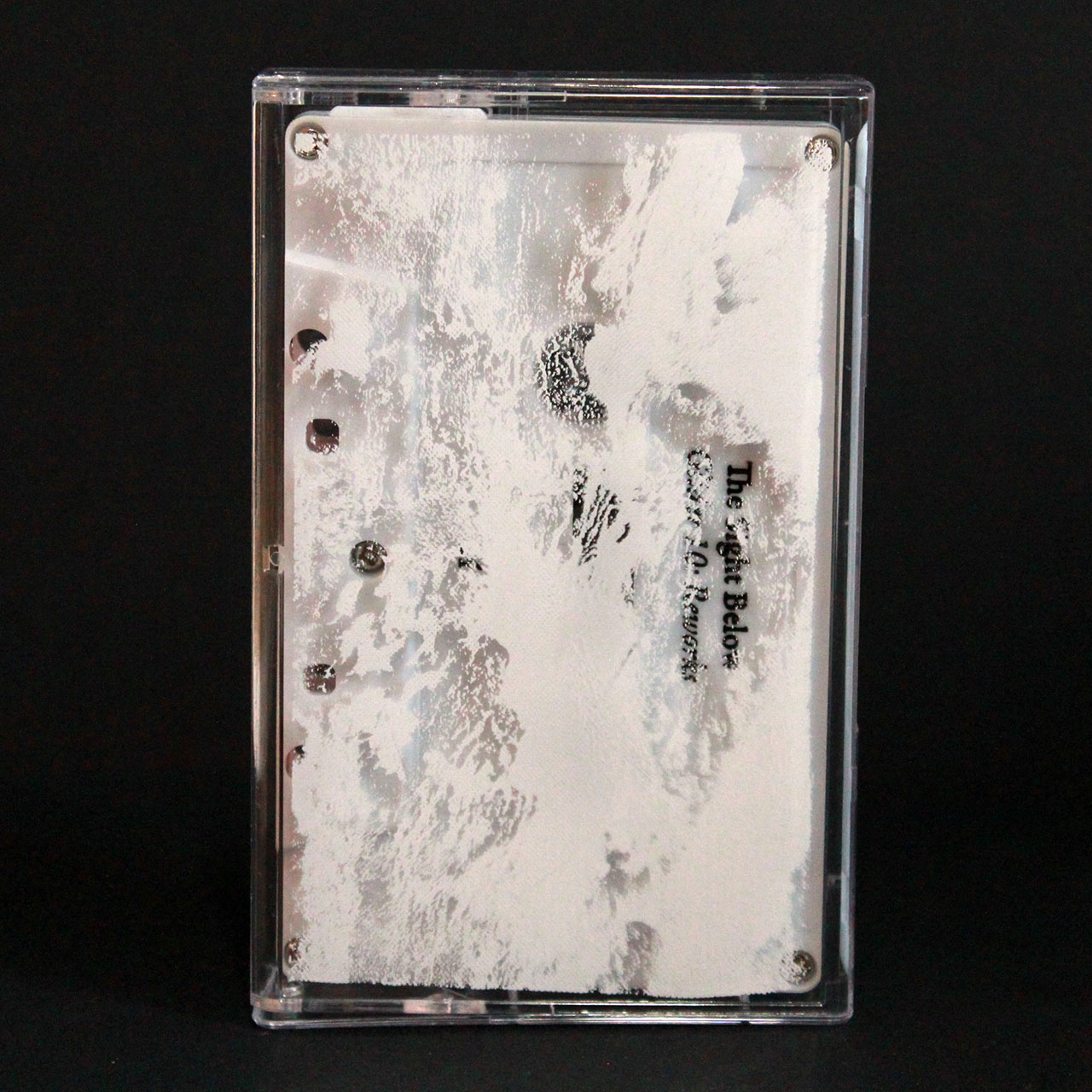 White pad print on clear Norelco audio cassette case