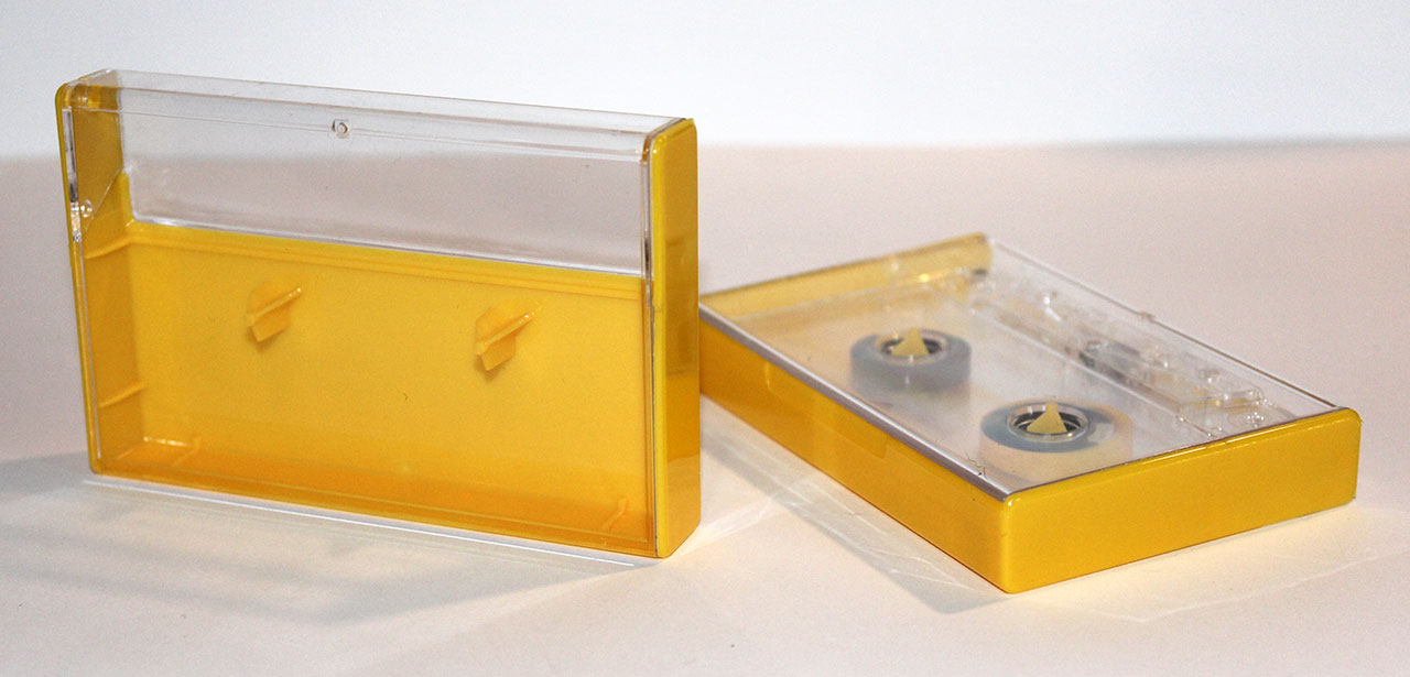 Norelco cassette case lemon yellow from Duplication.ca