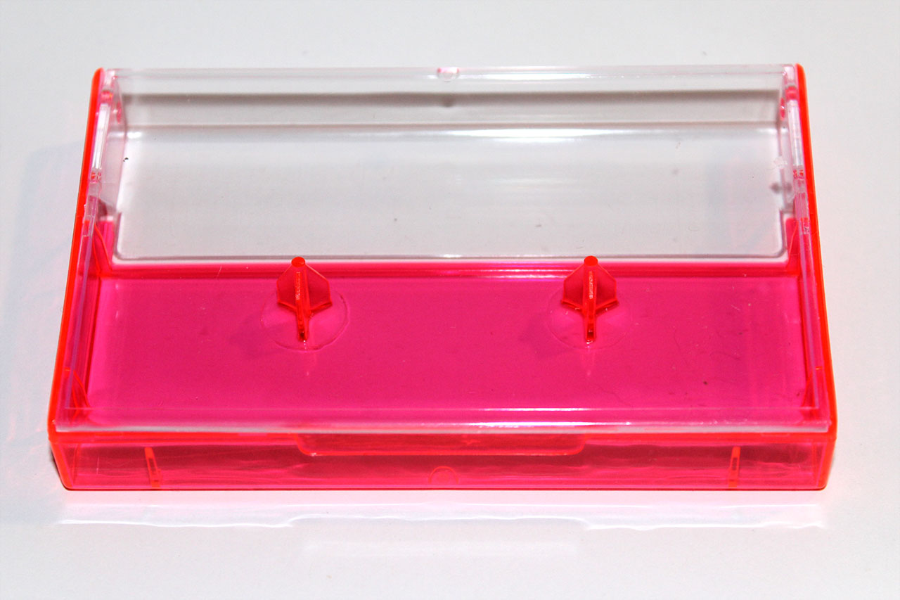 Norelco cassette case neon pink tinted from Duplication.ca
