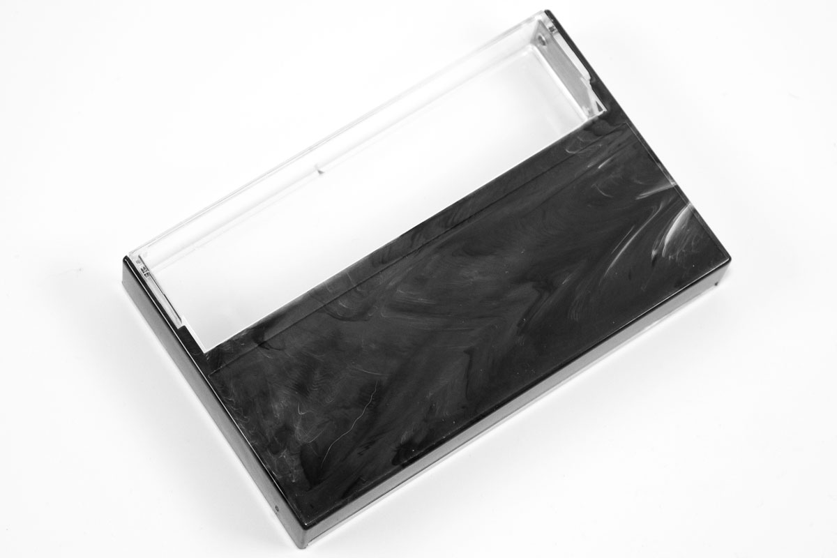 Back of Clear/Black Marble Cassette Cases with square corners