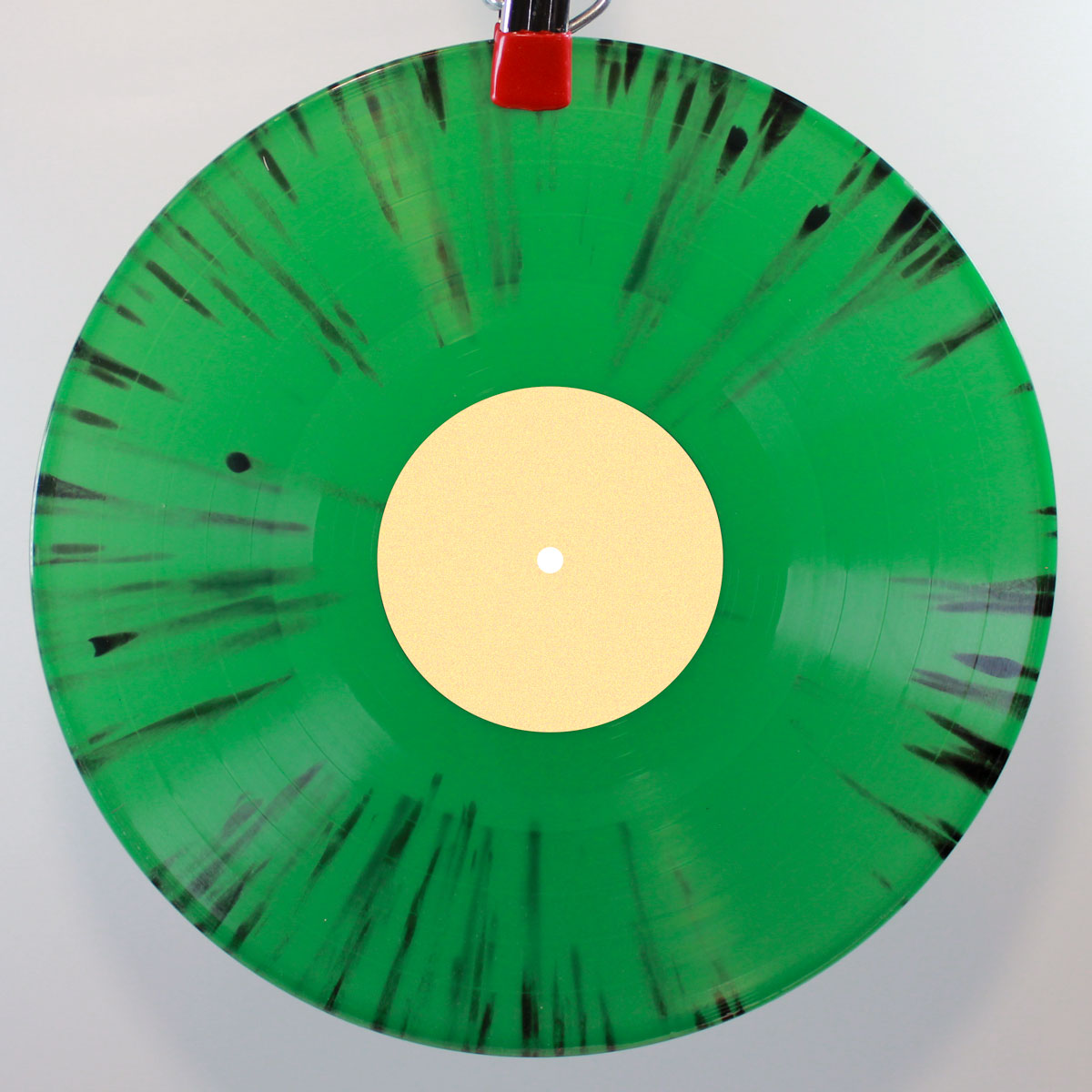 Opaque green vinyl w/ black splatter