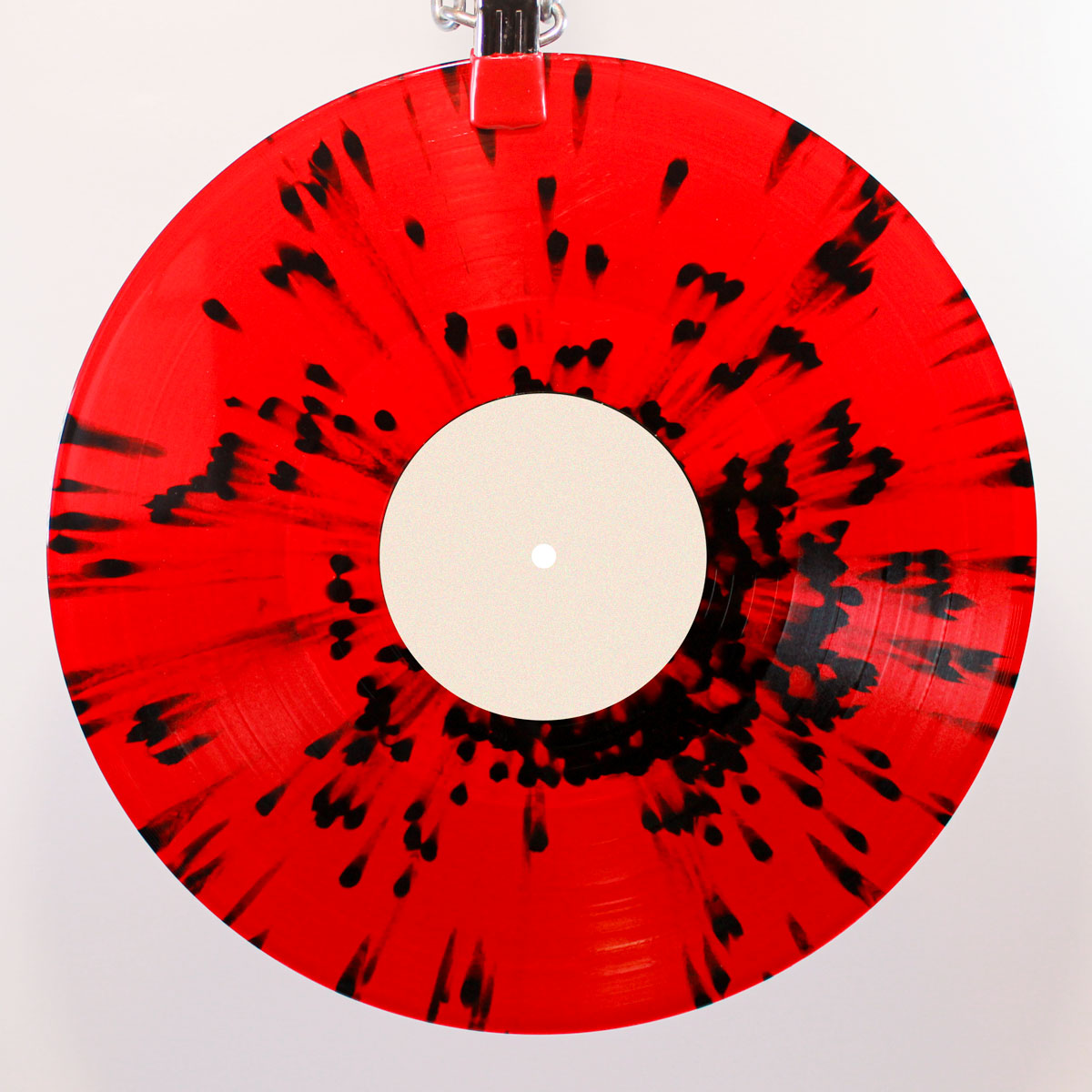 Red translucent vinyl with black splatter