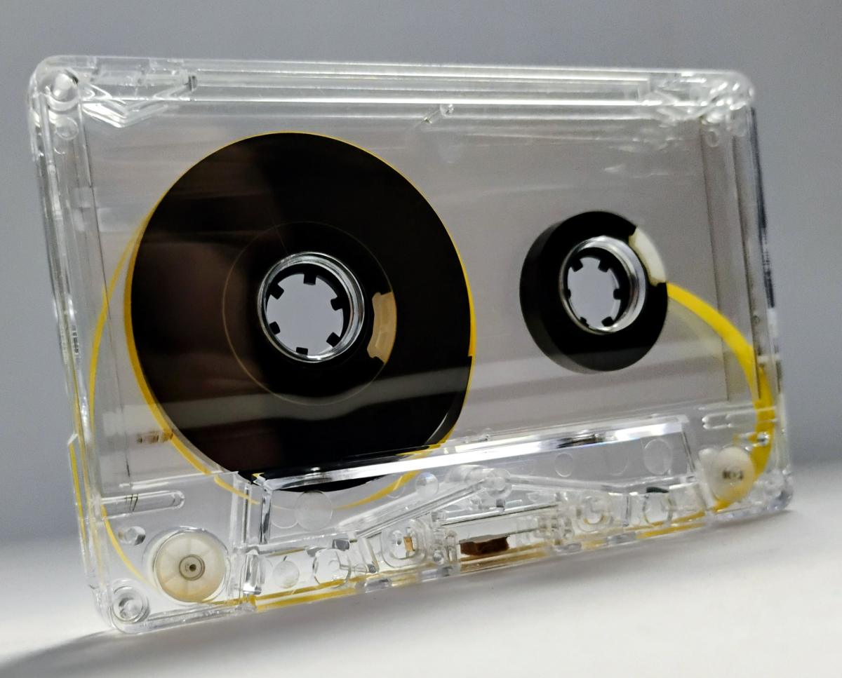 C-62 Transparent shell with Black hubs and yellow leader Type II Audio cassette