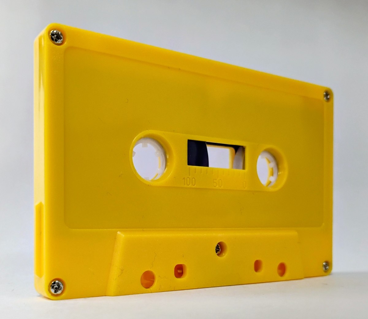 C-36 Yellow shell with silver screws China Type I Audio cassette