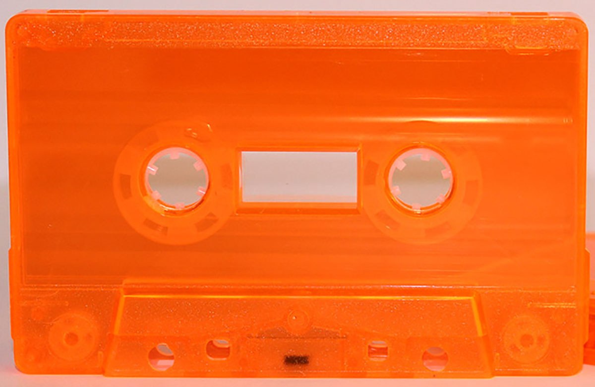 C-41 Fluorescent Orange shell with clear liners Fox/RTM Type I Audio cassette