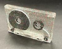C-59 High Bias Chrome Tape in Silver-Green-Red Glitter Cassette Shells. C-59 High Bias Chrome Tape in Silver-Green-Red Glitter Cassette Shells.