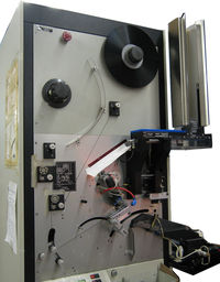 Audio cassette loader